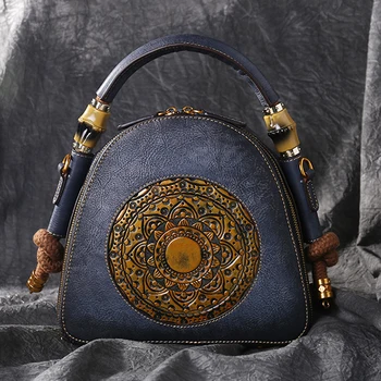 Yüksek kalite hakiki Kabartmalı Deri Üst Kolu Çanta Retro Çanta Totem Desen Doğal Cilt Kadın kol çantası postacı çantası
